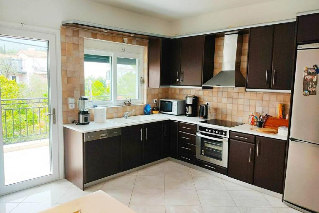 Peggy'S Lux Apartment Каравомилос Экстерьер фото